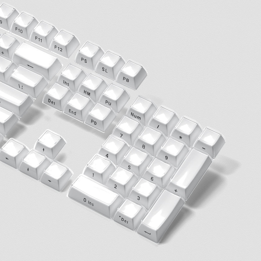 Womier jello translucent white keycaps close-up showing the glossy polycarbonate shell